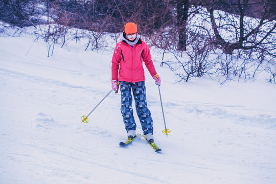 woman skier skiing on the snow-covered slope