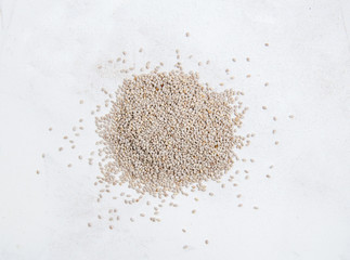 Heap of white chia seeds top view