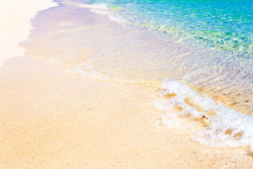 Wave of the sea on the sand beach