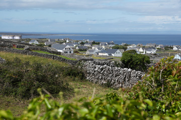 Caherard view and stone fence on inisheer island on aran islands