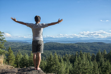 Young man at  Chinese mountain in Quadra Island, BC.