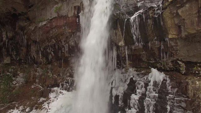4k Aerial Snow Tennessee Waterfall Crest 003 Boom Up Tilt Down