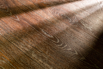 Rays of light from the door in a dark room