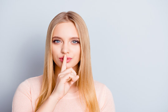 Mute dumb mystery say lips intimate delicate people forefinger speechless voiceless person concept. Close up portrait of charming tempting lovely cute girl making shhh isolated on gray background