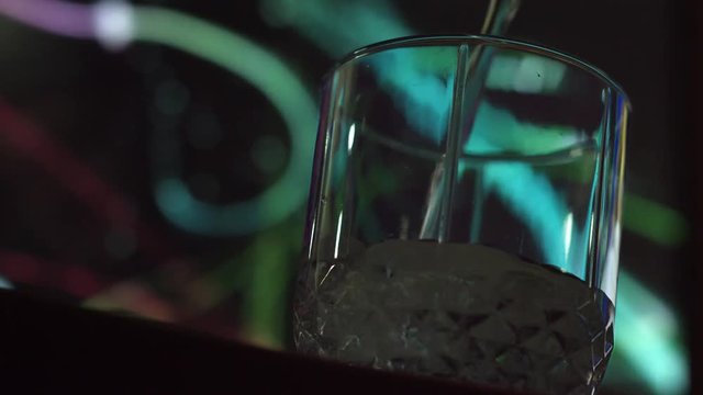 In a Glass of Water, Aspirin Dissolves. The glass is filled with water. Then in the glass is added effervescent asperin