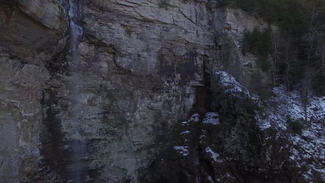 4k Aerial Snow Tennessee Waterfall Crest 002 Pan Left