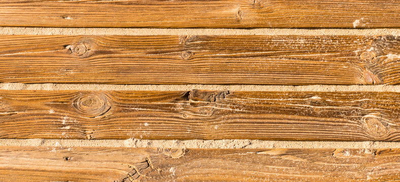 Wooden beach boardwalk with sand banner background