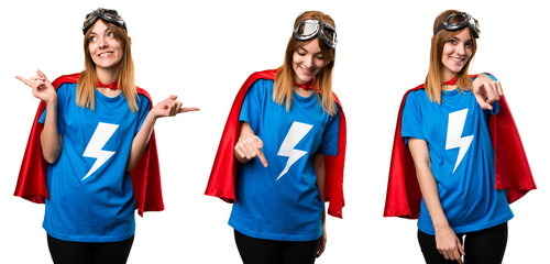 Pretty superhero girl pointing down, front and laterals © luismolinero
