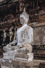 Fototapeta premium Wat Yai Chai Mongkol the most important historical temple that one of the most popular temples in Ayutthaya. The outstanding architecture pagoda. The surrounding area has a beautiful garden.