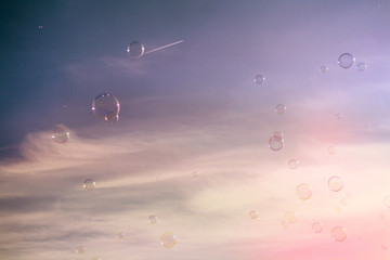 bright and beautiful soap bubbles on the sky background