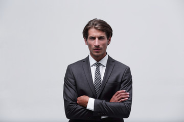 thoughtful businessman adjusting his tie.