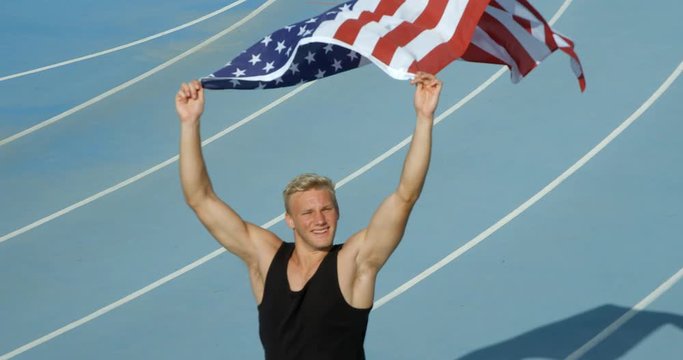An Athlete Celebrates with the national flag of the United States of America