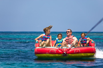 Family water sport adventure on the sea