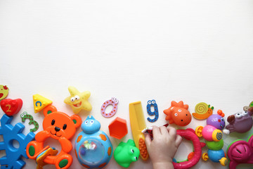 Children's toys and accessorieson a White background.view from above © dyageleva