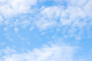 Naklejka na ściany i meble White clouds on the blue sky. Sky texture