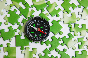 compass on the green puzzle