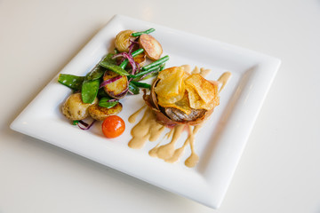 delicious dish on a square plate