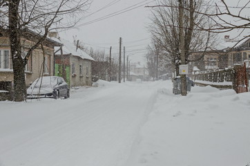 Majestic view of residential district  with heavy snowfall in winter, Zavet, Bulgaria 