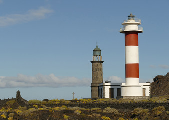Fototapeta na wymiar La Palma, lighthouse at the punta de Fuencaliente on the coast of the Atlantic Ocean