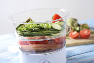 raw food in a steam cooker