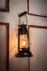 Old lantern on the wall.