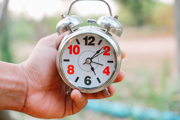 An Alarm Clock Set To 5 to 6 AM to Wake up early