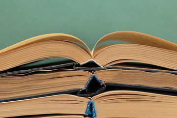 old books on a wooden shelf