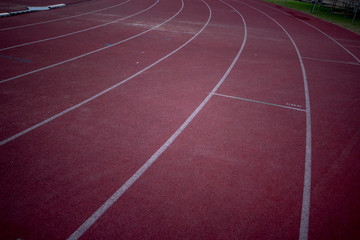 Fototapeta premium Red running track at night