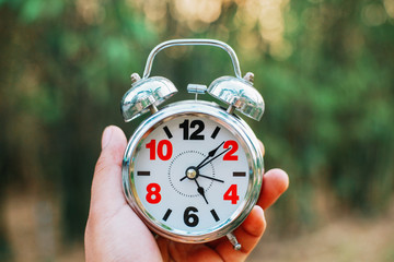 An Alarm Clock Set To 5 to 6 AM to Wake up early