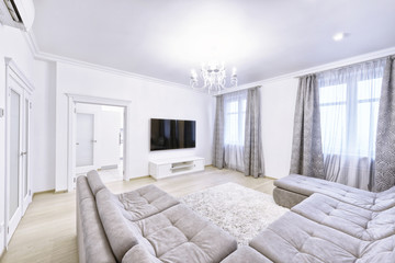 The interior of the modern living room in white.