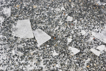 shards of ice on the stone texture background