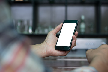 Man using smartphone at coffee shop