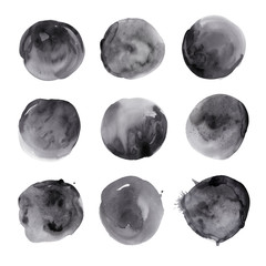 Set of hand drawn watercolor black spots. Collection ink round stains. Isolated on white background. Wet texture, grained paper. A deep saturated tone. A kit of blotches.