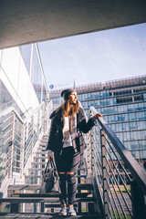 young woman posing looking away outdoor - thoughtful, serious, confidence concept