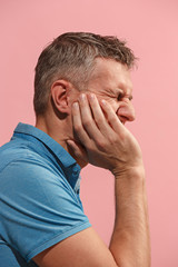 Fototapeta premium Young man is having toothache.
