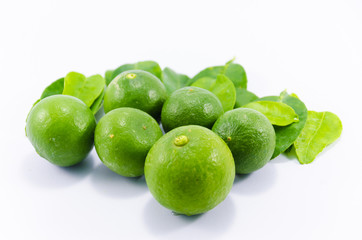 fresh green lemon on white background