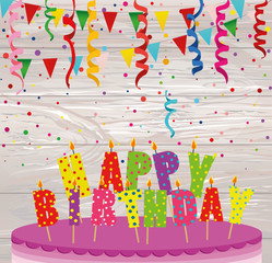 Fototapeta na wymiar A festive big cake with candles. Letters Happy Birthday. Colorful