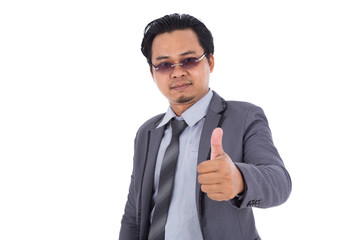 business man in suit with thumb up isolated on white background