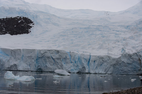 Antarctic beach with glacier