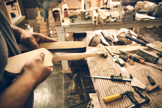 Manufacture of guitars.