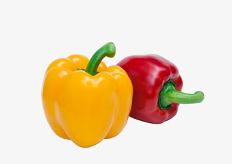 Red and yellow sweet bell pepper isolated on white background, close up.