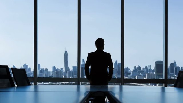 4k Vision concept, Businessman looking something in city.