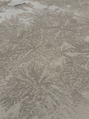 Plenty of sand balls created by crabs on secluded beach on Koh Chang island in Thailand