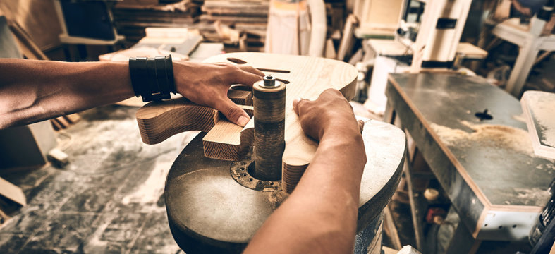Manufacture of guitars.