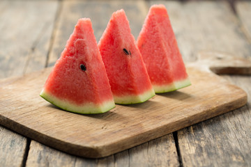 Watermelon on wooden floor