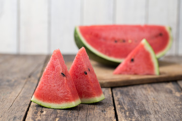 Watermelon on wooden floor