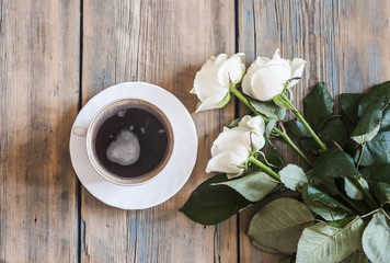 White roses on a old white wooden table