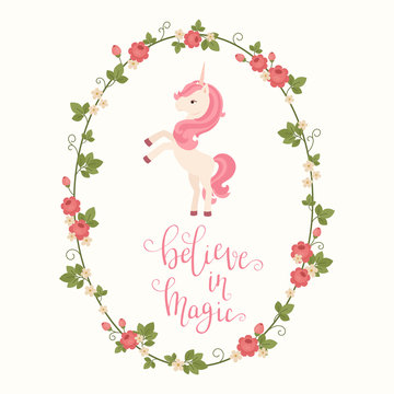 Unicorn in a floral frame and hand lettering "believe in magic"