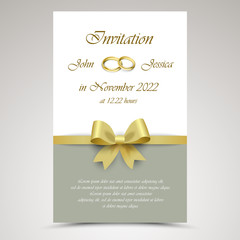 Wedding announcement with gold ribbon and rings