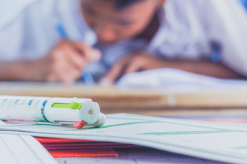 Secondary school students taki final exams.
